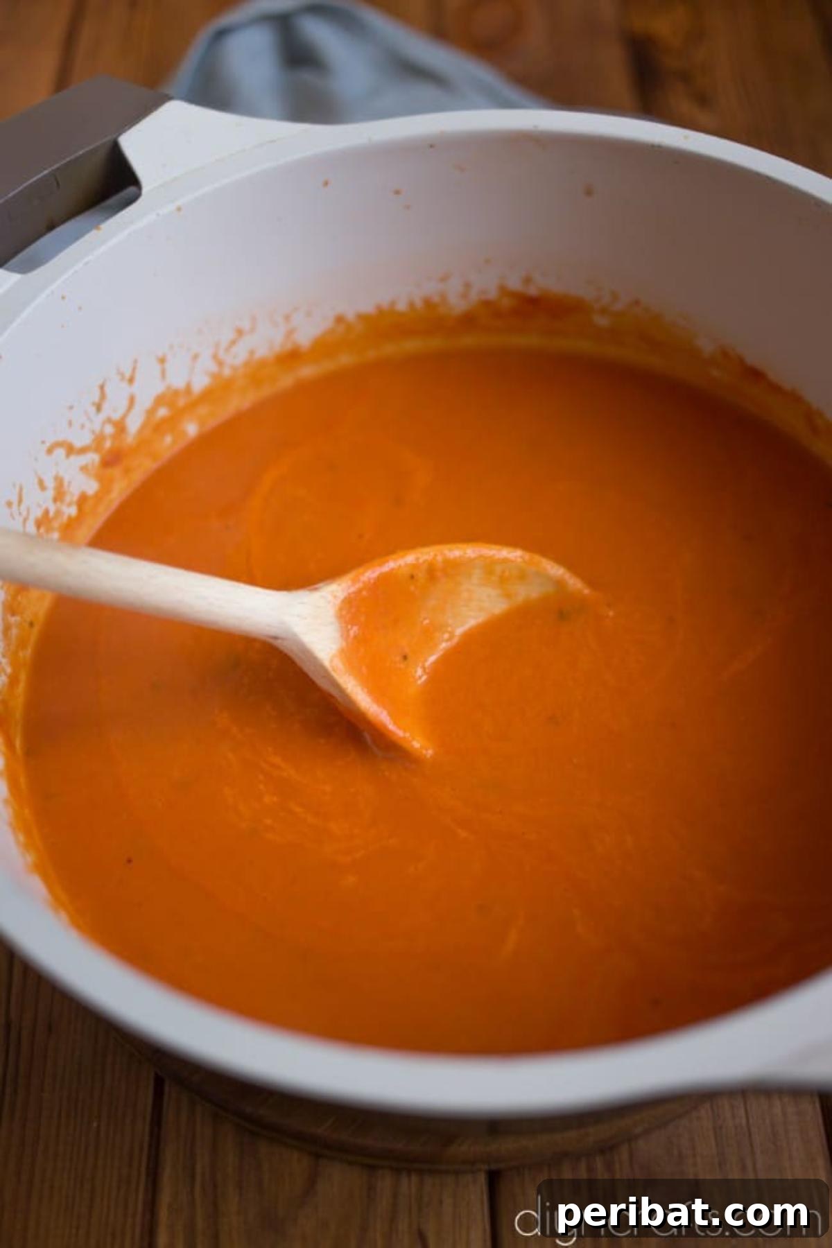 All the soup ingredients simmering together in a single pot, before the tortellini is added.