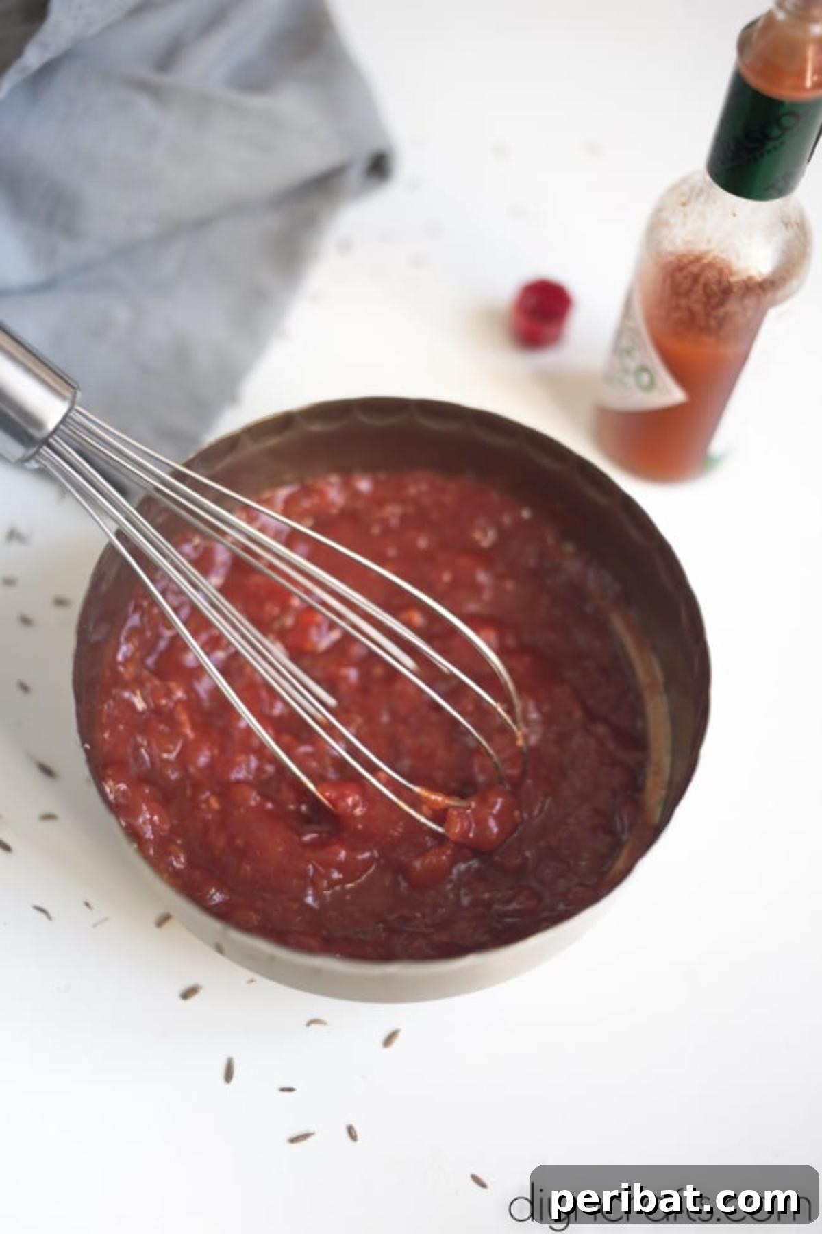 Vegan Burrito Power: High-Protein, Low-Fat Snacking Perfected 4 Preparing homemade spicy tomato sauce for burritos.