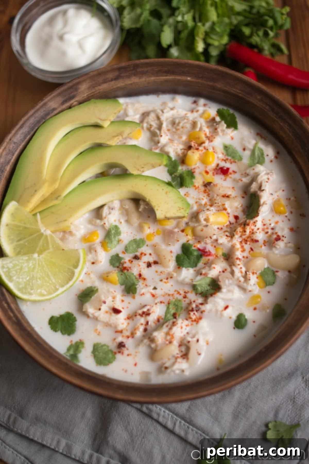 Dressing up the chili with avocado and lime.