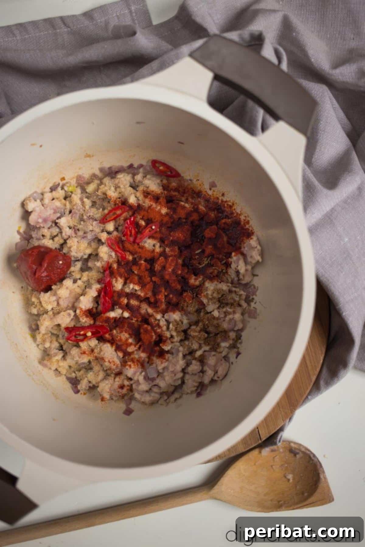 Potluck Perfection: A Delicious Quinoa Chili 4 Aromatic Spices Being Mixed for Quinoa Chili Base