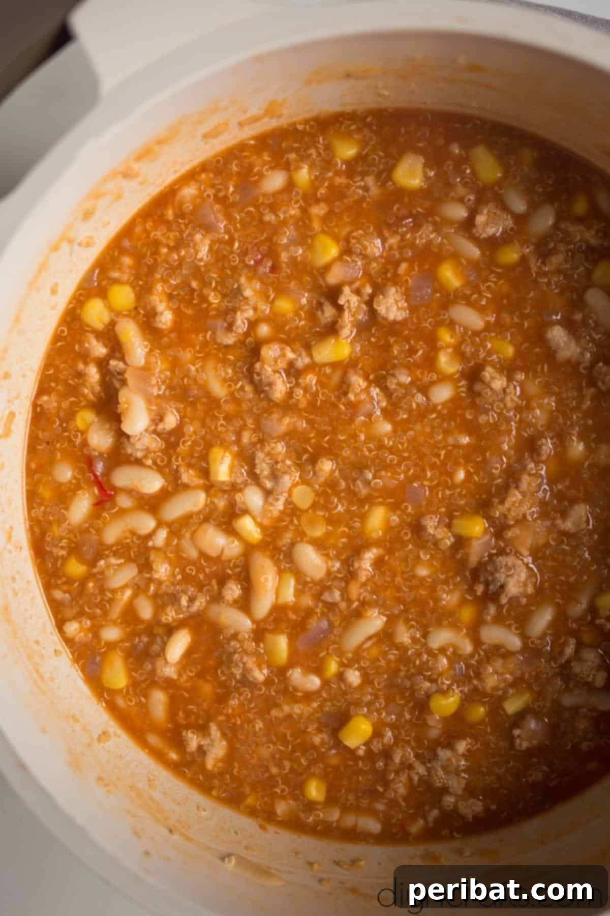 Potluck Perfection: A Delicious Quinoa Chili 5 All Ingredients Combined and Cooking in a Pot for Quinoa Chili