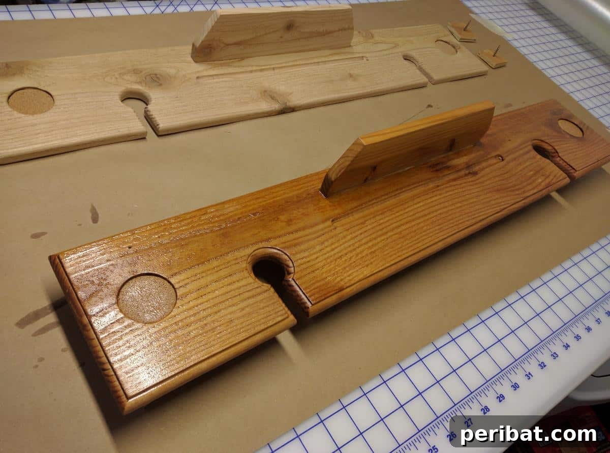 Applying a protective wood finish to the completed bath tray to enhance durability and appearance.