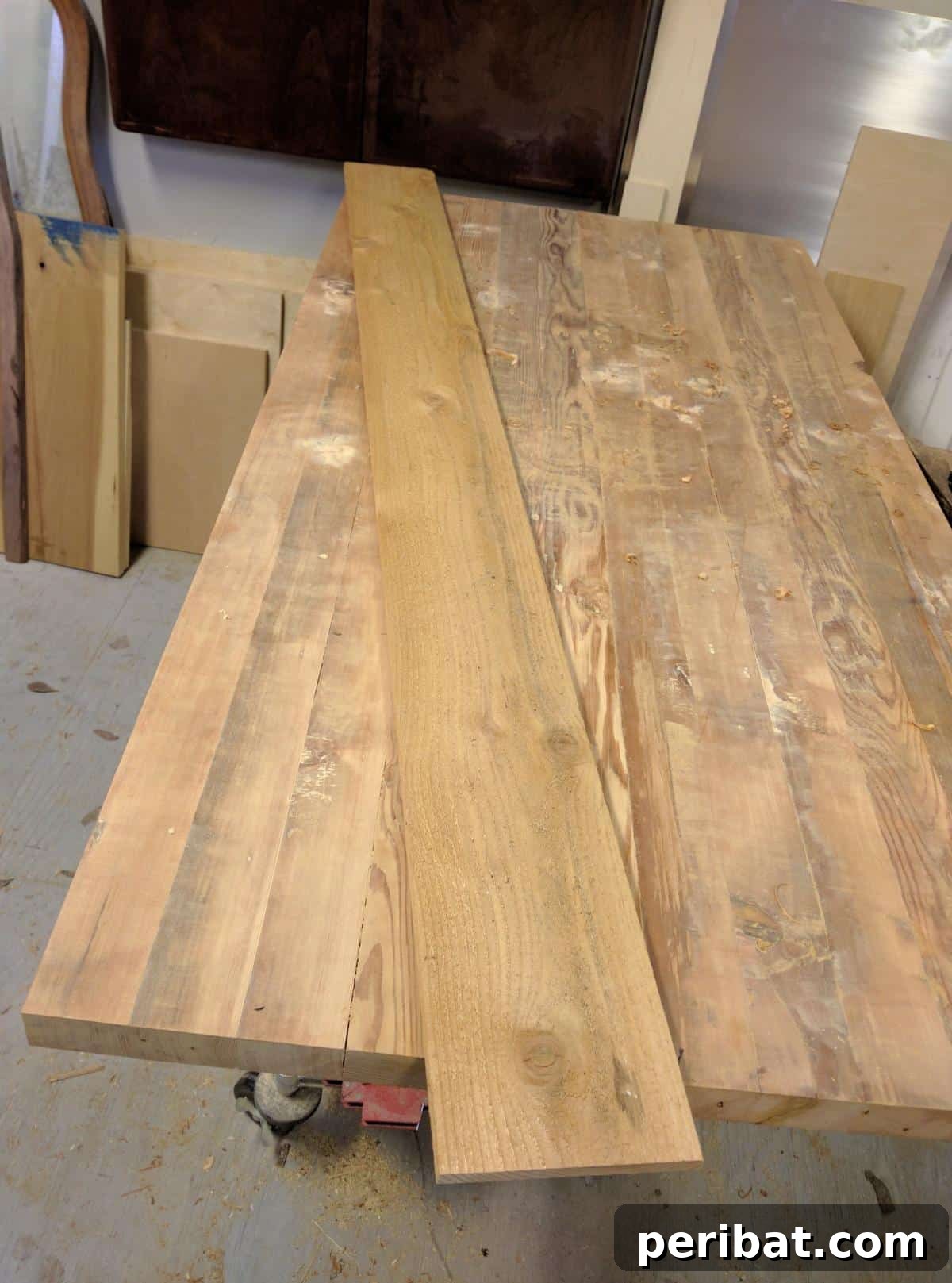 A raw wood plank, the starting material for creating a DIY bath tray.