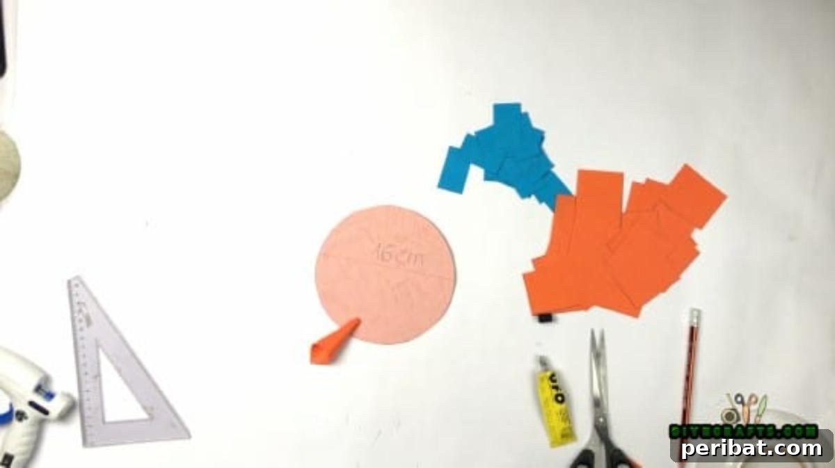 Step 5: Gluing the first layer of orange paper cones on the cardboard base