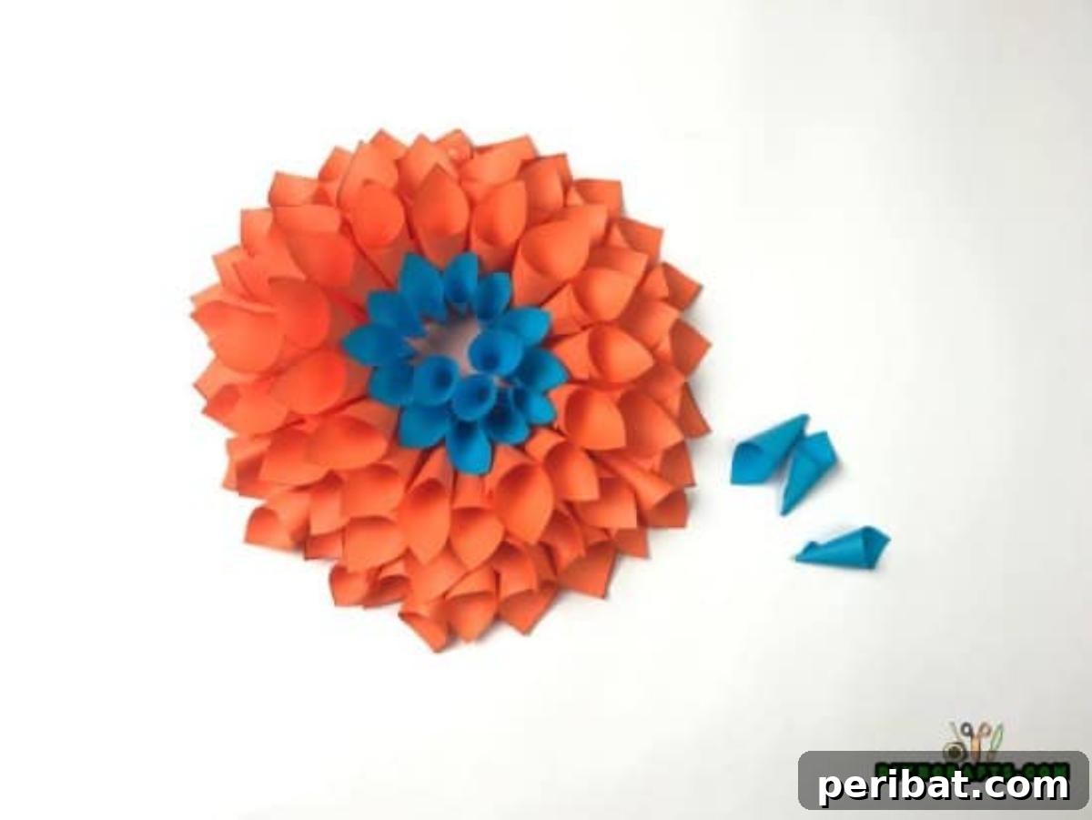 Step 7: Final layers of blue paper cones for the wreath's center