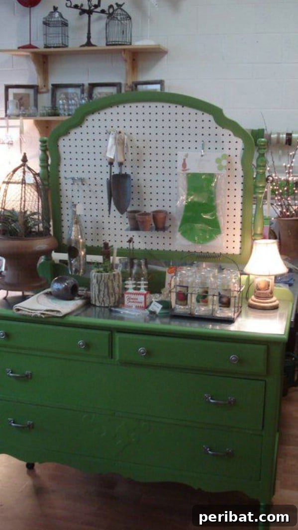 Upcycled Mirror Frame transformed into a Garden Shed Pegboard for tool organization