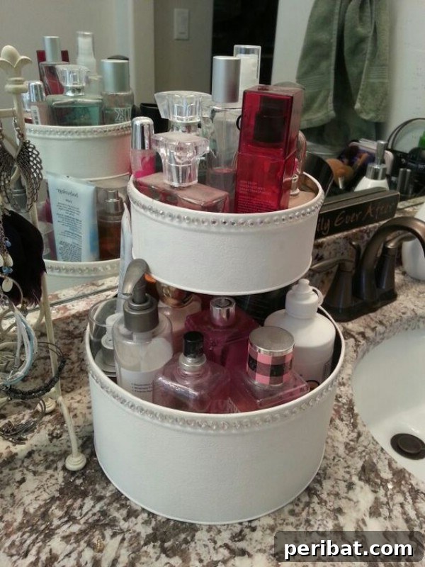 20 Ingenious Popcorn Tin Transformations 17 DIY Tiered Makeup Organizer from Popcorn Tins