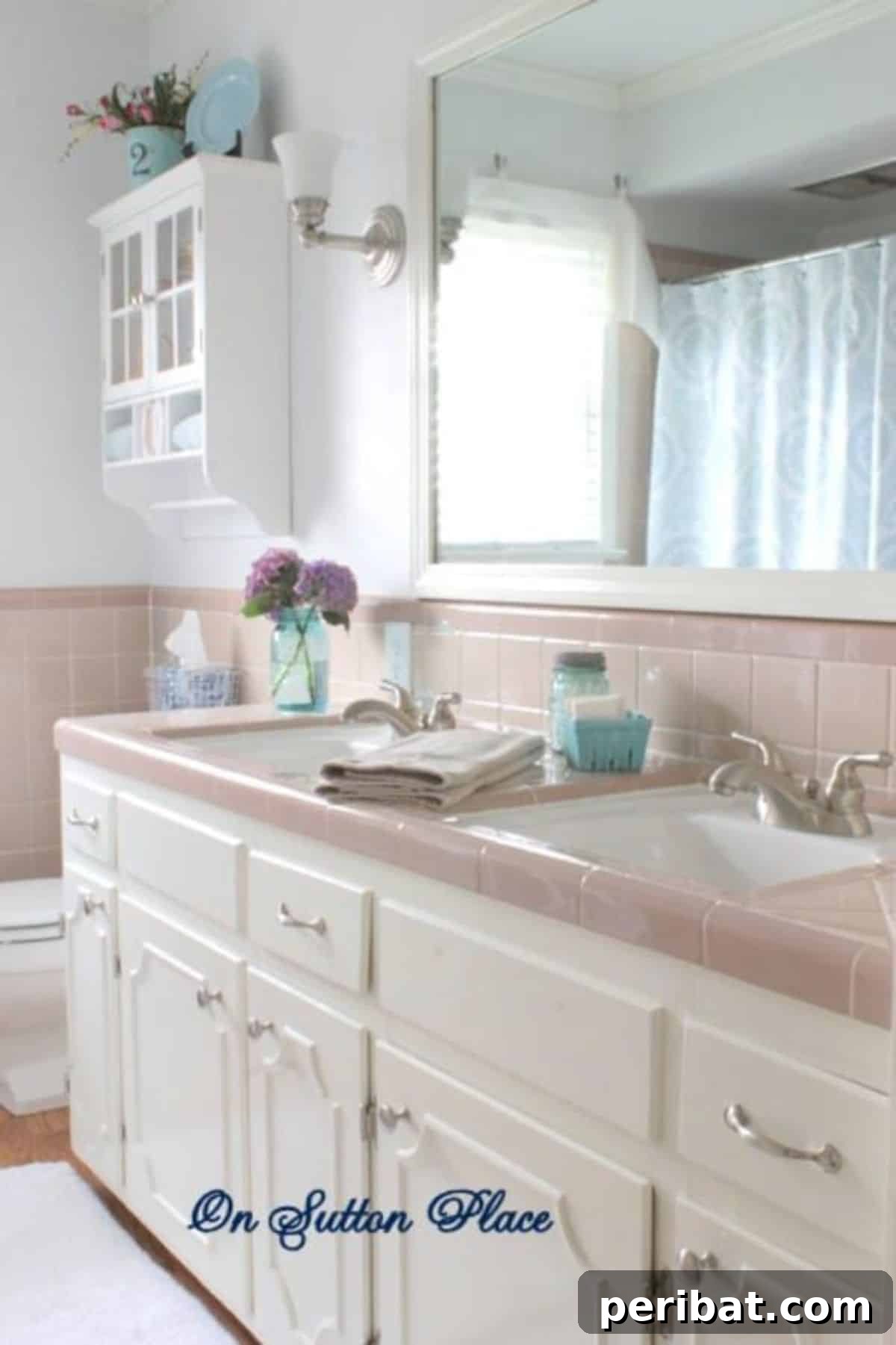 Updated Bathroom with stylish vanity and storage
