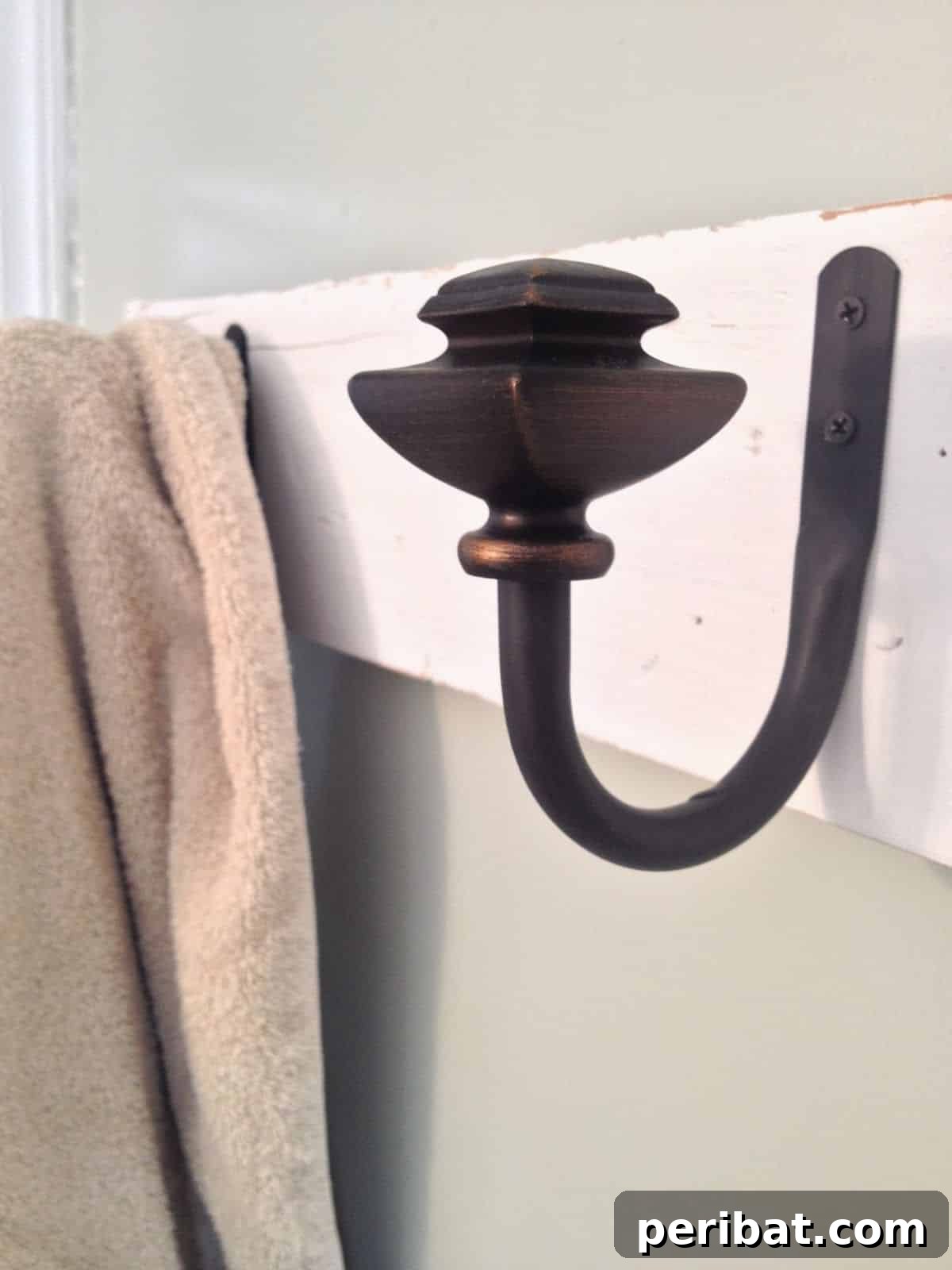 DIY Towel Hooks from Old Curtain Tie Backs, a creative reuse