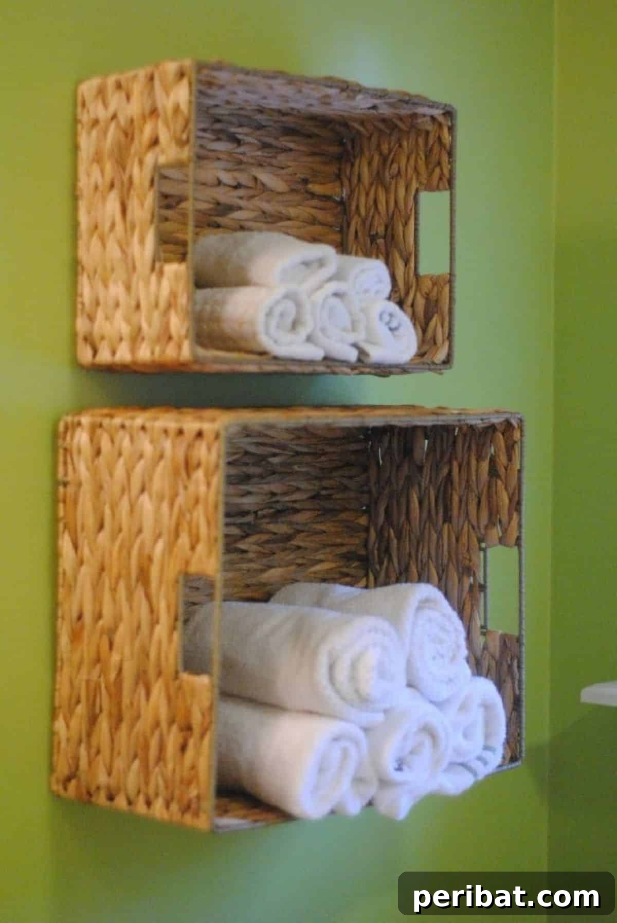 DIY Bathroom Towel Storage using wall-mounted wicker baskets