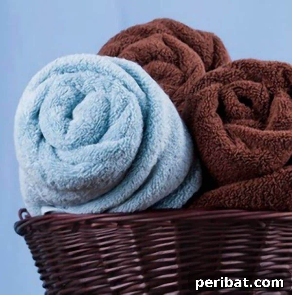 Storing Bath Towels rolled in a basket