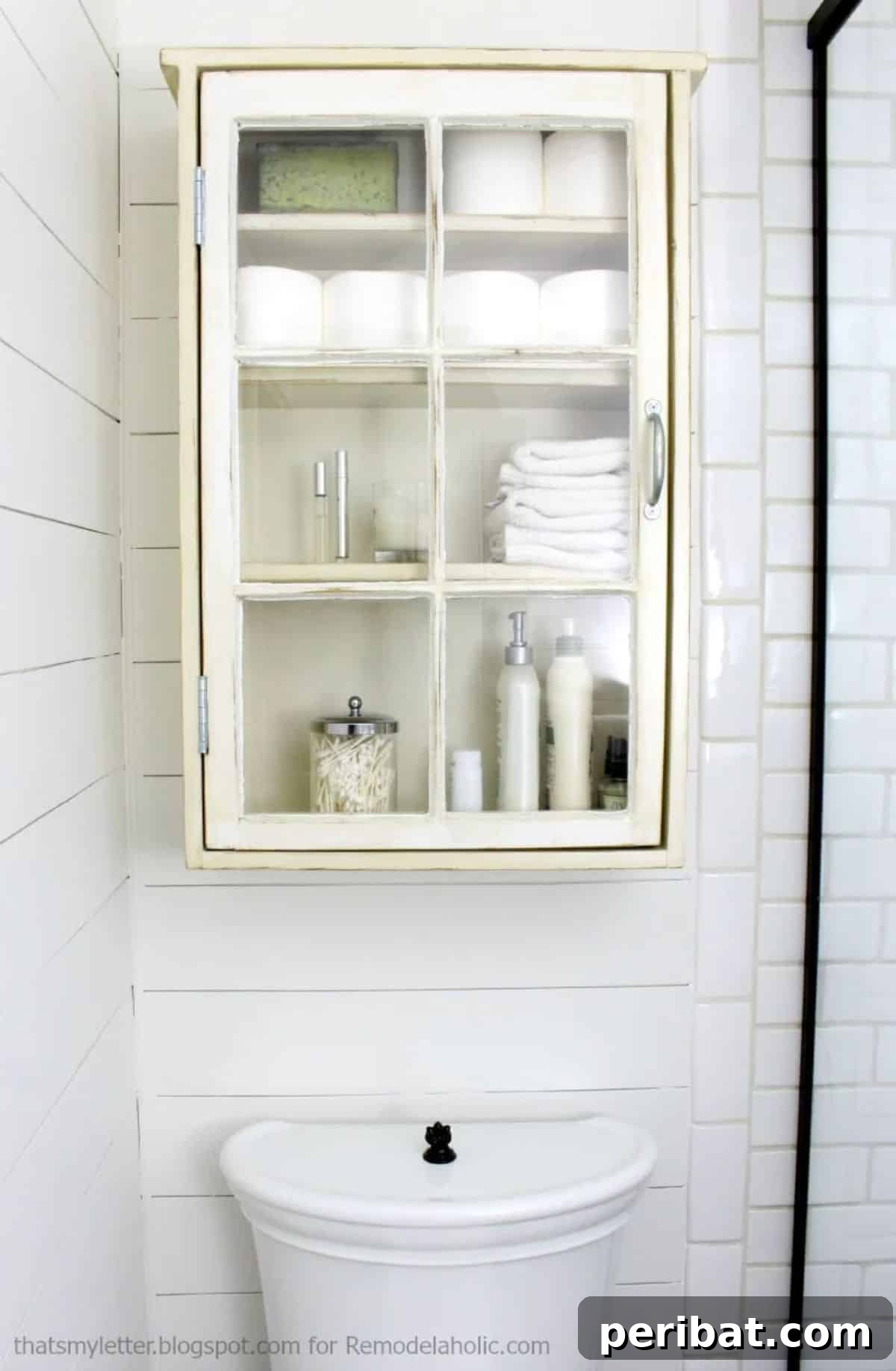 Bathroom Storage Cabinet using an old Window, repurposed