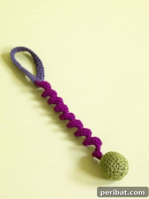 Hook, Line, & Purr: 25 Easy Crochet Projects for Cats 13 Crochet Door Hanger Bouncy Toy
