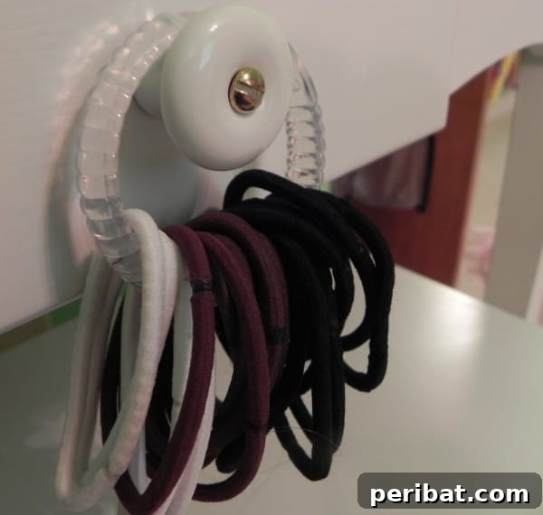 Shower Curtain Rings for Storing Ponytail Holders - 150 Dollar Store Organizing Ideas and Projects for the Entire Home