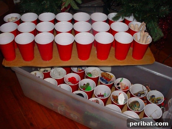 Red Plastic Cups Keep Christmas Ornaments Safe - 150 Dollar Store Organizing Ideas and Projects for the Entire Home