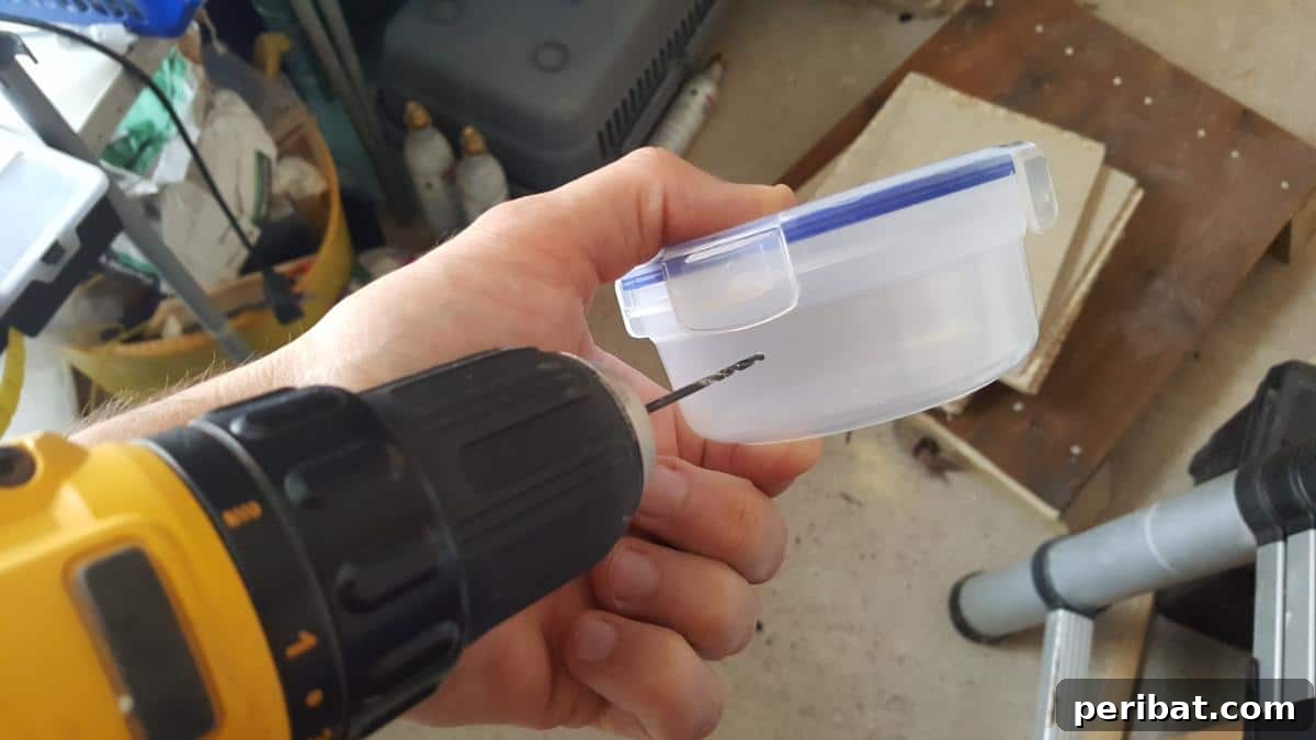 How to Build a Humane Slug and Snail Repelling Fence: Drilling Container Holes