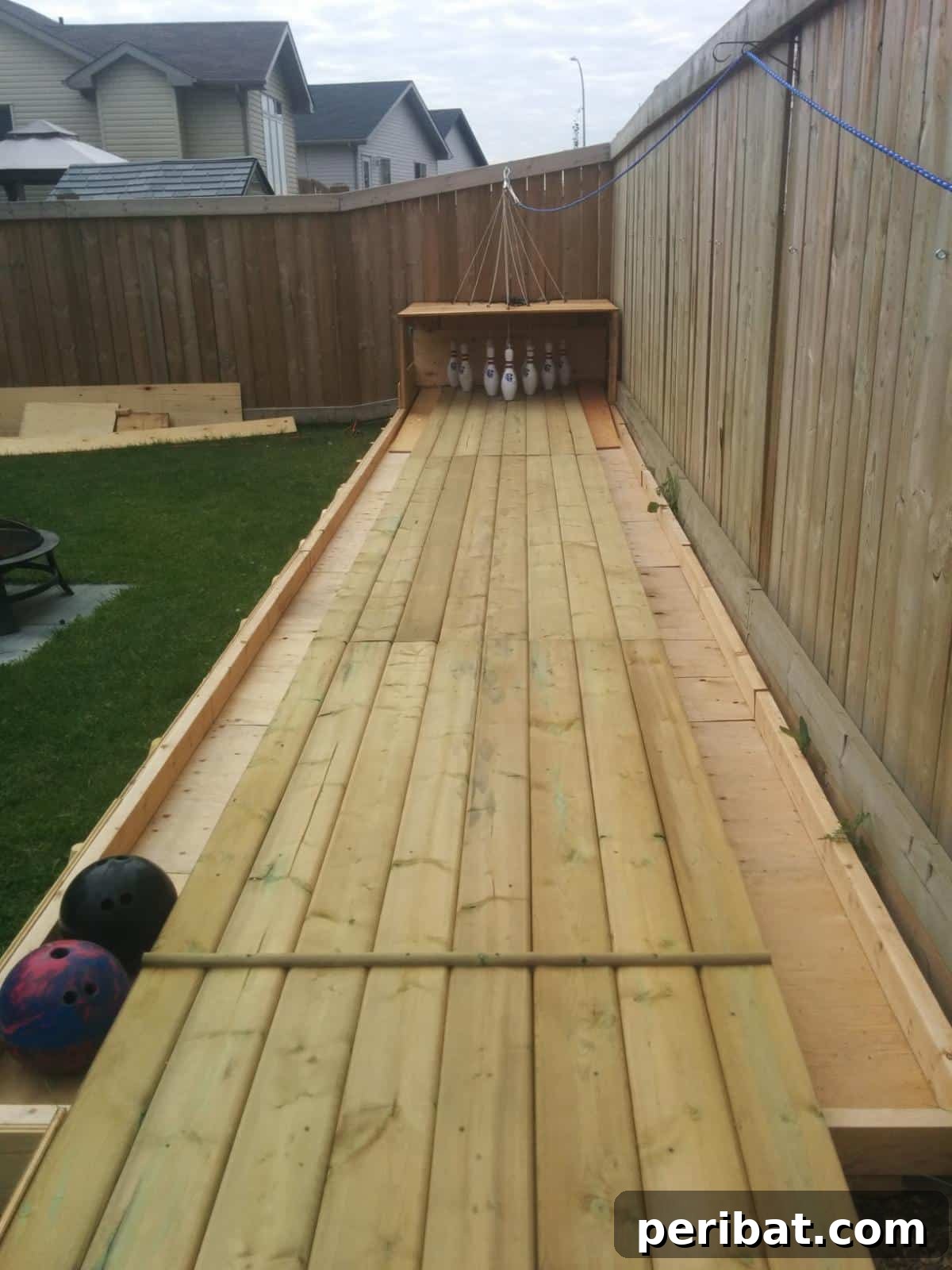 Build Your Own Backyard Bowling Alley for Summer Fun 11 An overhead view of the completed backyard bowling alley, showing the full length and surrounding area.