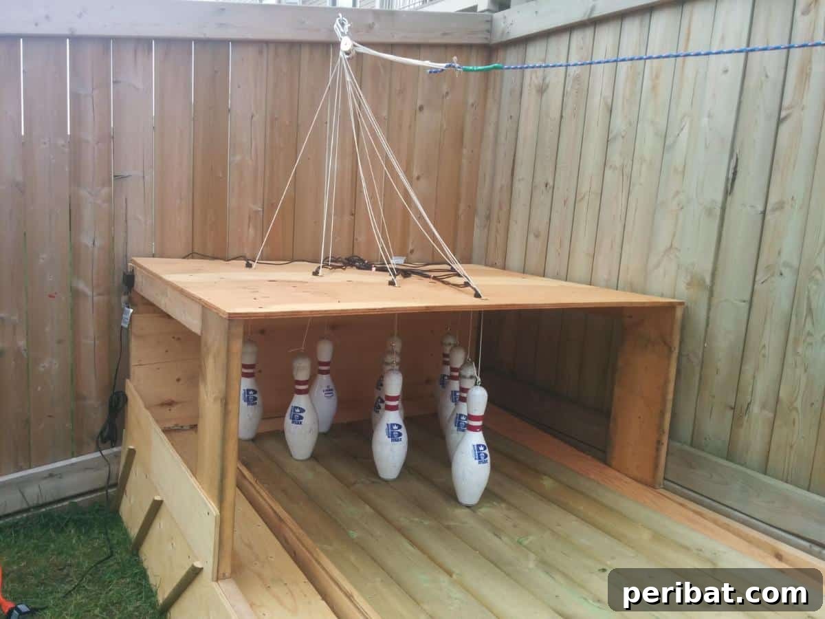 Build Your Own Backyard Bowling Alley for Summer Fun 12 Close-up of the pin deck area, showing the neatly arranged bowling pins.