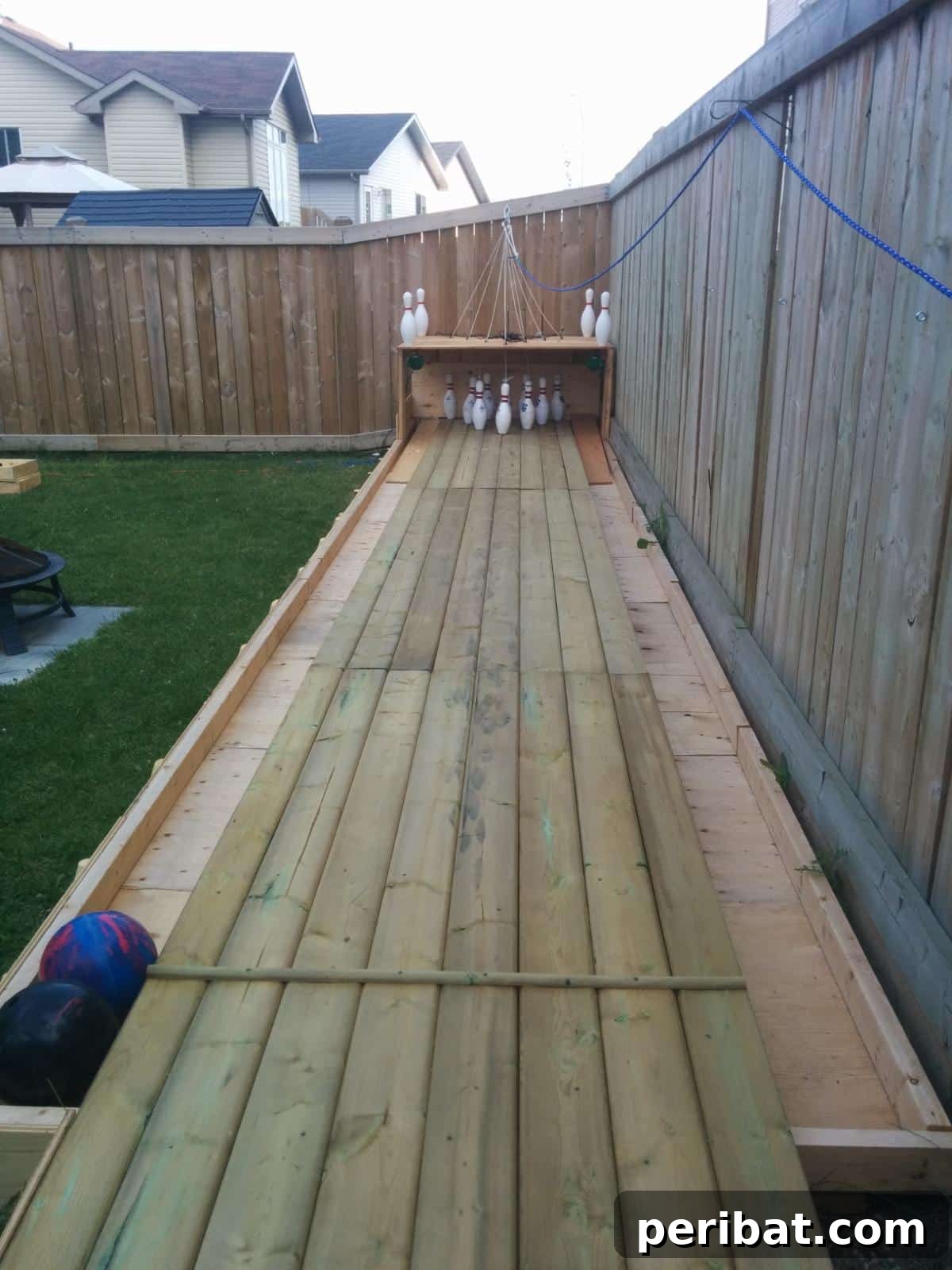 Build Your Own Backyard Bowling Alley for Summer Fun 13 View of the approach area and the beginning of the lane, emphasizing smooth transitions.