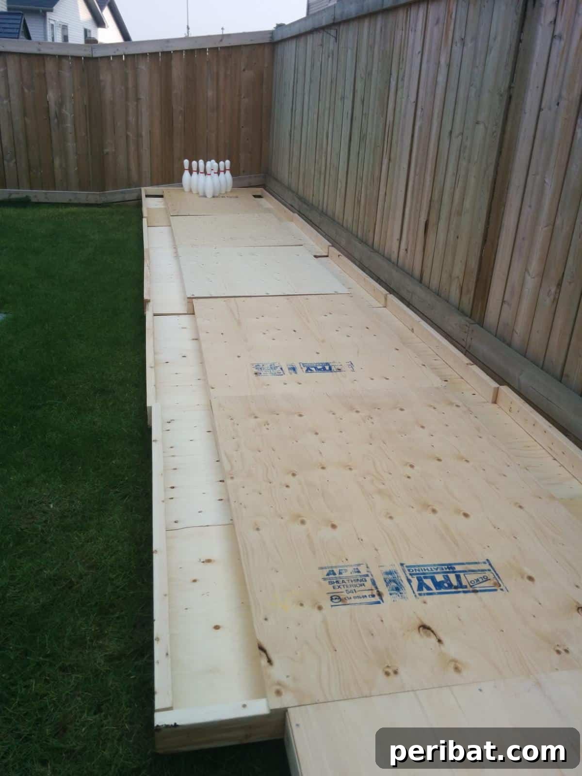 Build Your Own Backyard Bowling Alley for Summer Fun 8 Construction of the main wooden framework that supports the bowling lane surface.