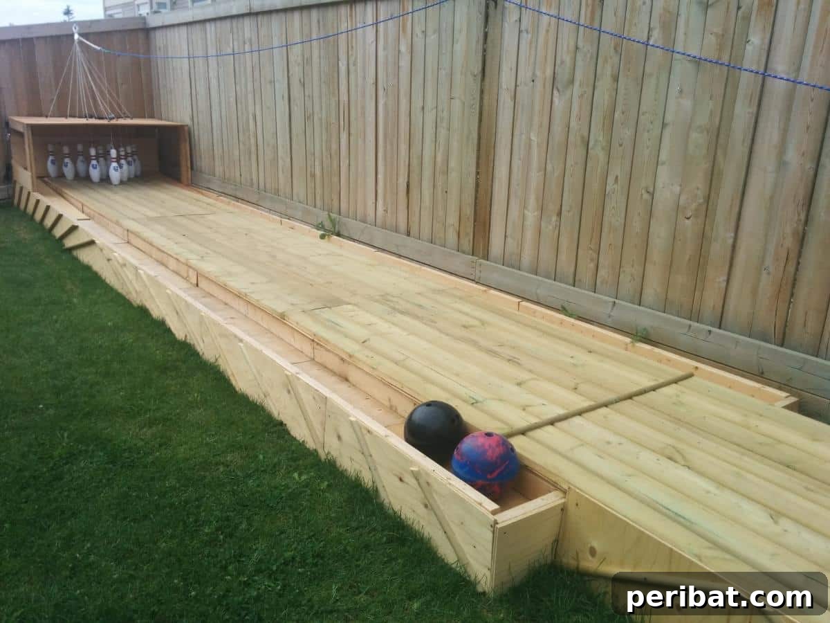 Build Your Own Backyard Bowling Alley for Summer Fun 10 The nearing completion of the bowling alley, with gutters and pin deck area being finalized.