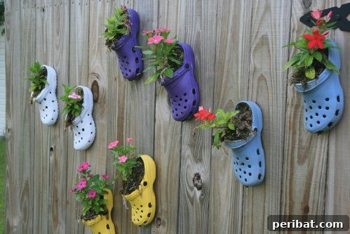 Stunning Fence Decor Ideas to Beautify Your Yard 13 Repurposed Croc Planters for Fence