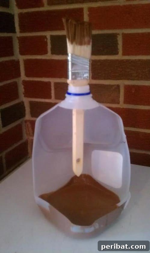 Repurposing a Milk Jug as a Convenient Paint Holder and Brush Rest