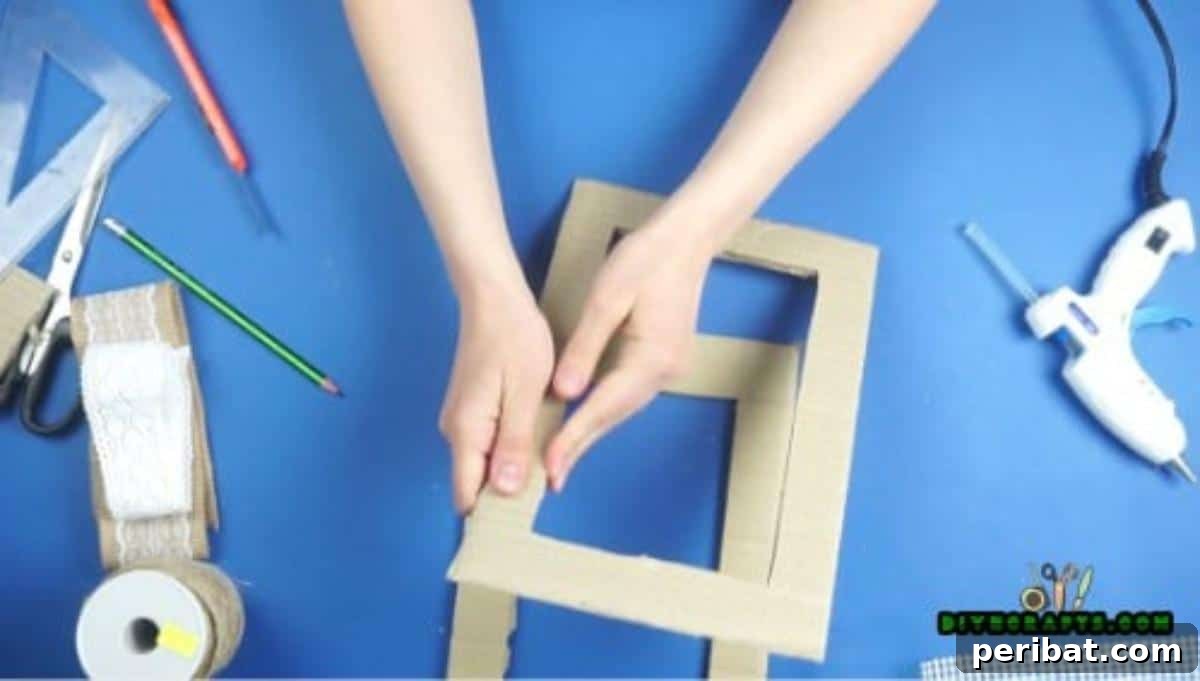Craft Your Own Stylish Hanging Jewelry Organizer 8 Inner cut of cardboard frame, Step 1 detail