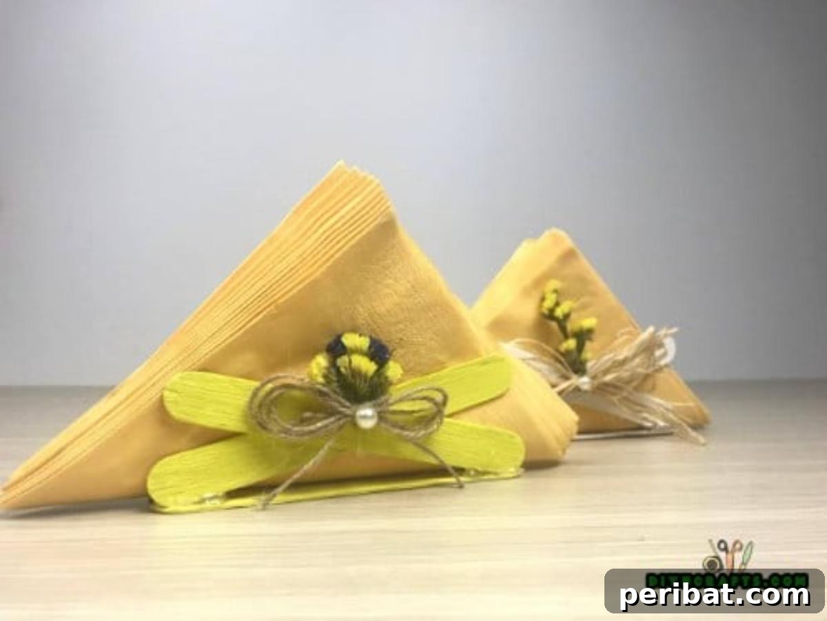 Popsicle Stick Perfection: Easy DIY Napkin Holders 10 Finished popsicle stick napkin holders in natural wood.