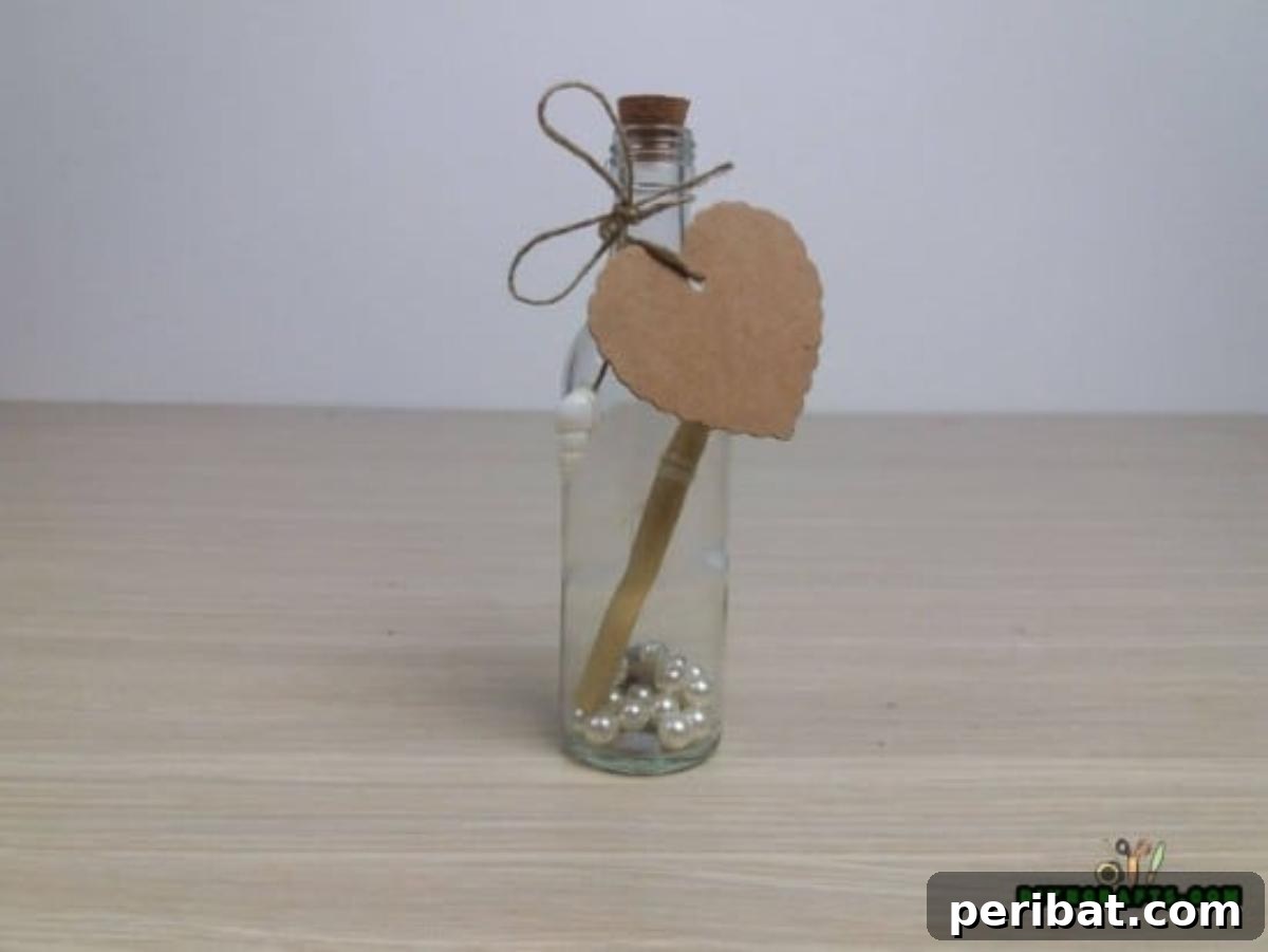 The finished message bottle, corked and adorned with a personalized tag.