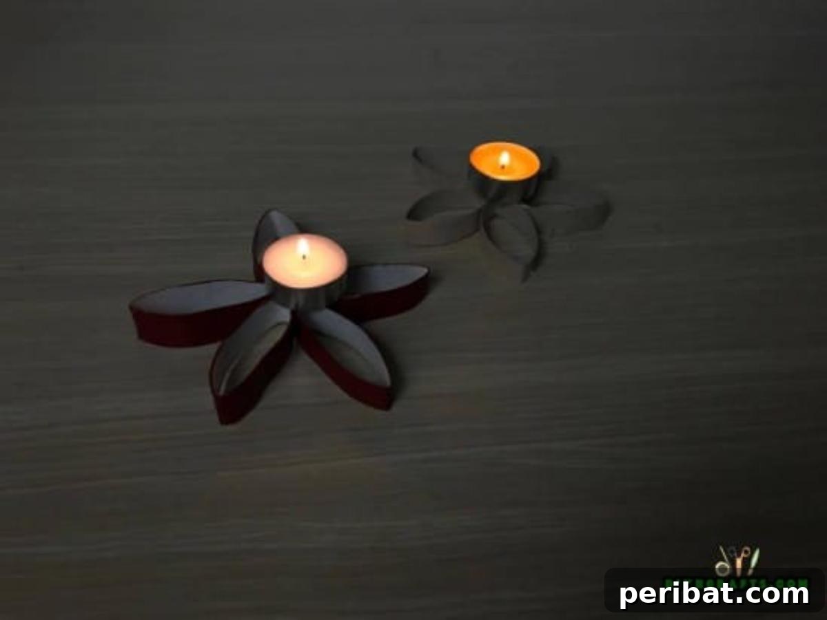 A finished paper roll flower candle holder with a tea light placed in the center, ready for display.