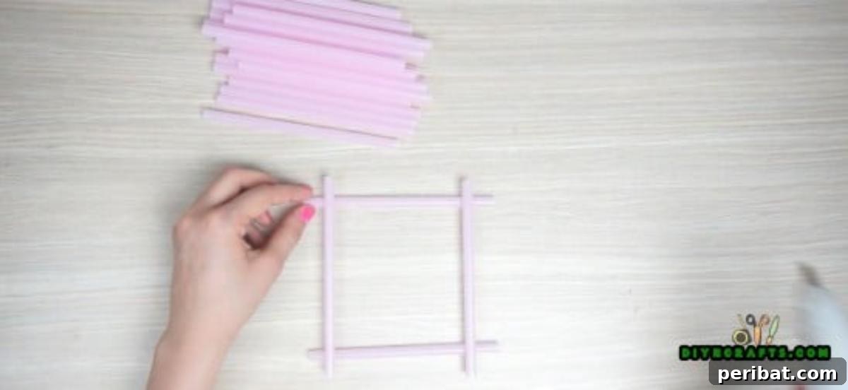 Candle Holder - Step 1: Close-up of the square base of the straw candle holder