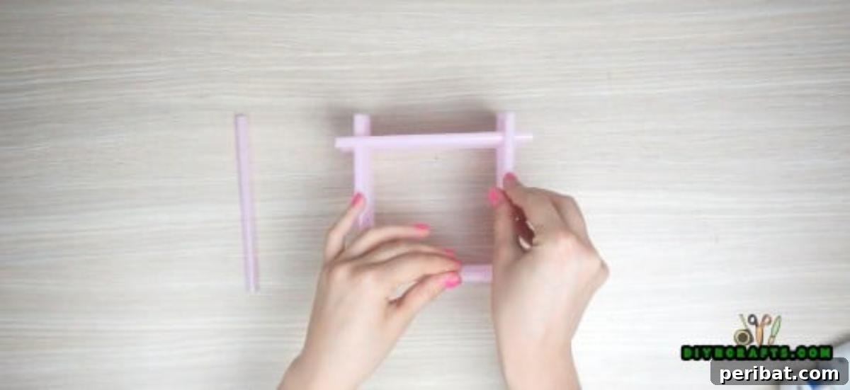Candle Holder - Step 4: Progress shot of the growing straw candle holder structure
