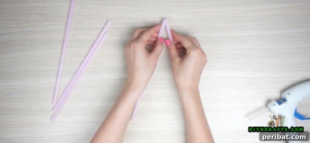 Hanging Stars - Step 1: Arranging five straws to form a star shape