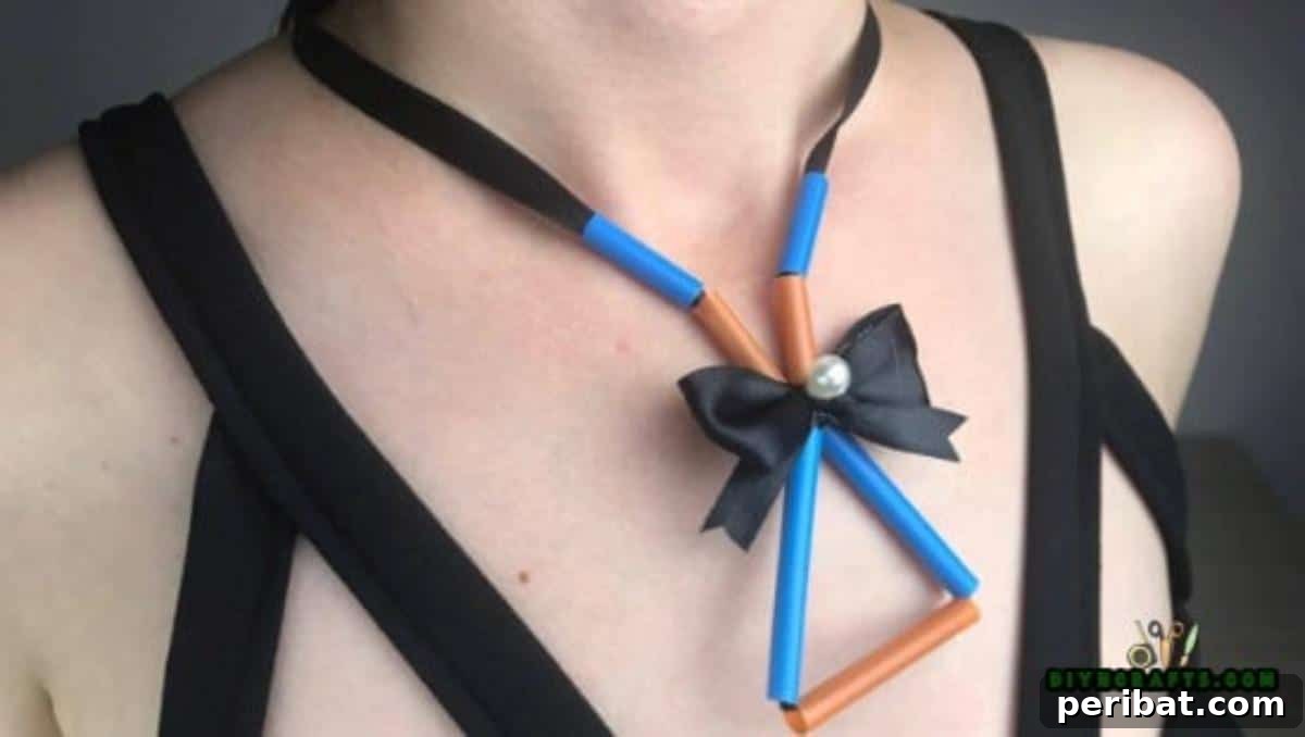 Necklace - Step 6: Model wearing the finished colorful straw necklace