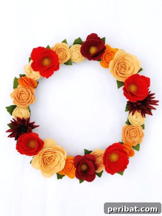 40+ DIY Fall Wreaths to Perfectly Deck Your Front Door for Autumn 34 Harvest Felt Flower Wreath