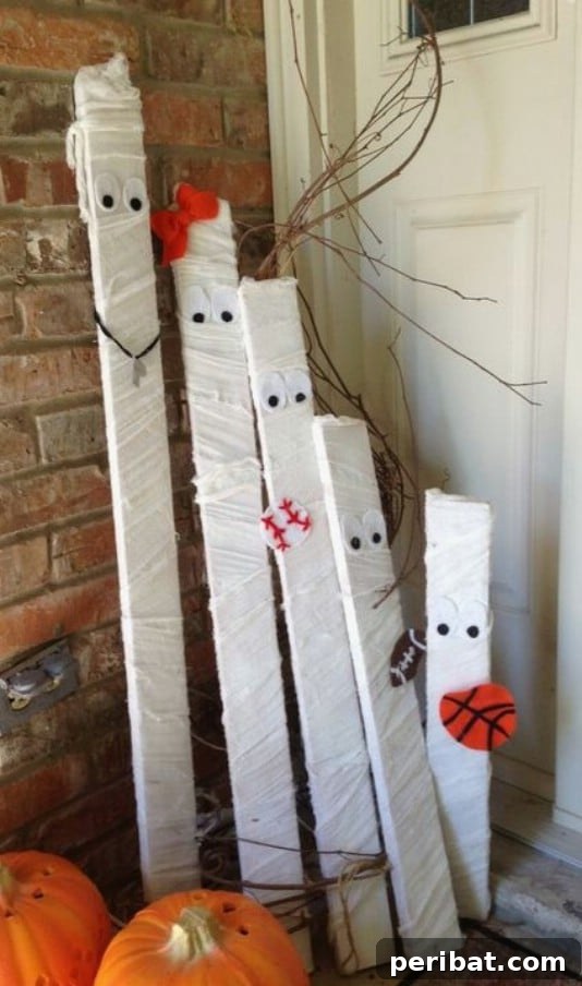Eco-Chic Spooks: Upcycled Wood Halloween Decorating for Home & Yard 20 Reclaimed Wooden Stake Mummies - 25 Fantastic Reclaimed Wood Halloween Decorations For Your Home And Garden