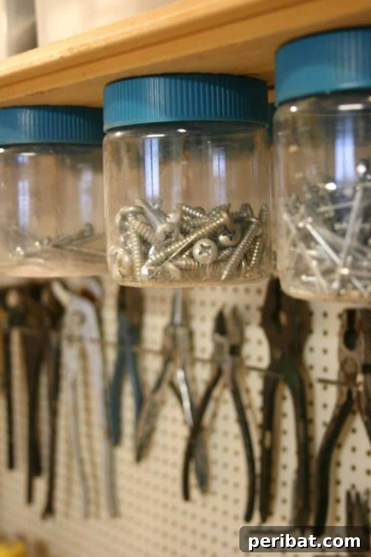 49 Creative Garage Organization Solutions 33 DIY hanging jars storage.