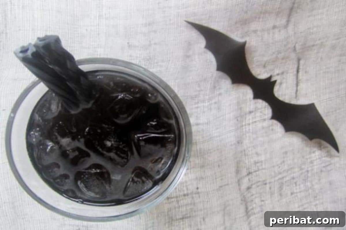 30 Bewitching Brews for Your Halloween Bash 3 Bat Juice Halloween Mock Cocktail