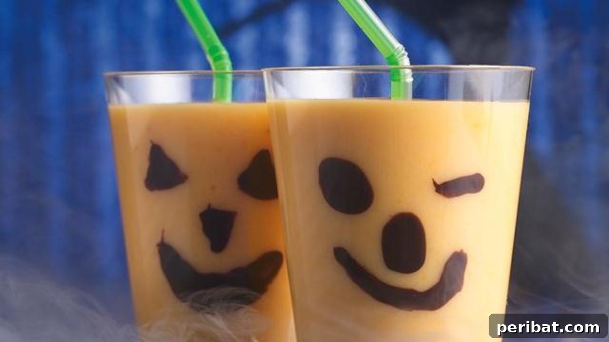 30 Bewitching Brews for Your Halloween Bash 22 Jack-O-Lantern Smoothies