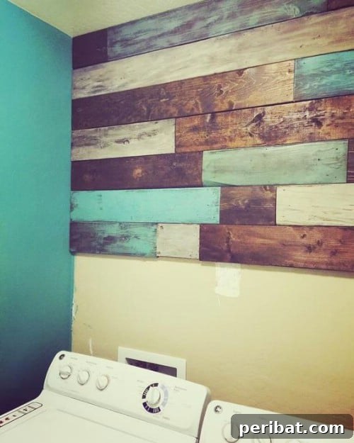 Teal painted wood sections contrasting with natural wood, emphasizing modern and rustic fusion in home decor.