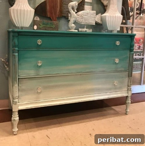 50 Ombre Home Decor Projects to Transform Your Home with Gradient Splendor 20 This set of drawers is evocative of the beach.