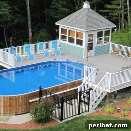 Above-ground pool integrated with an extravagant deck and pool house