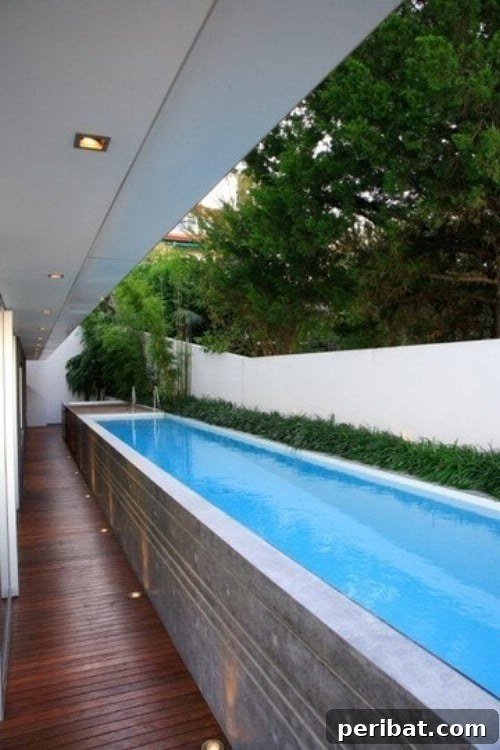 Extended above-ground swimming pool designed for lap swimming and exercise