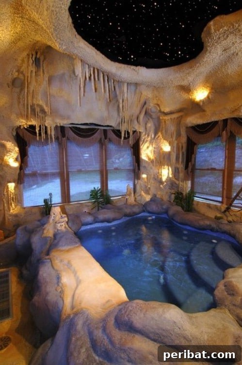 Swimming pool integrated into a stunning, custom-built grotto or 'cave'