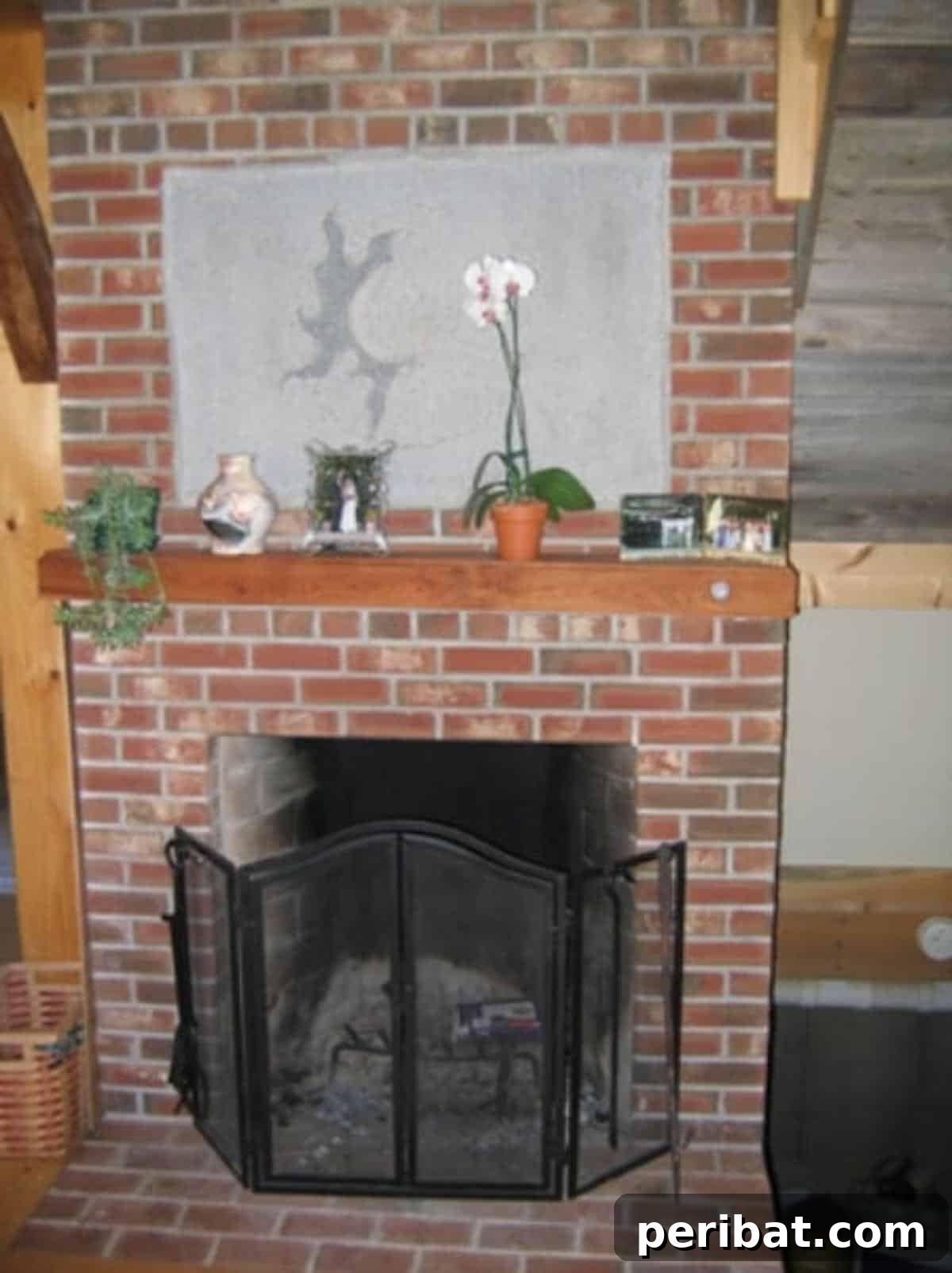 Beyond the Box: 5 Brilliant Baking Soda Uses You Need to Know 4 An indoor brick fireplace being cleaned with baking soda paste.