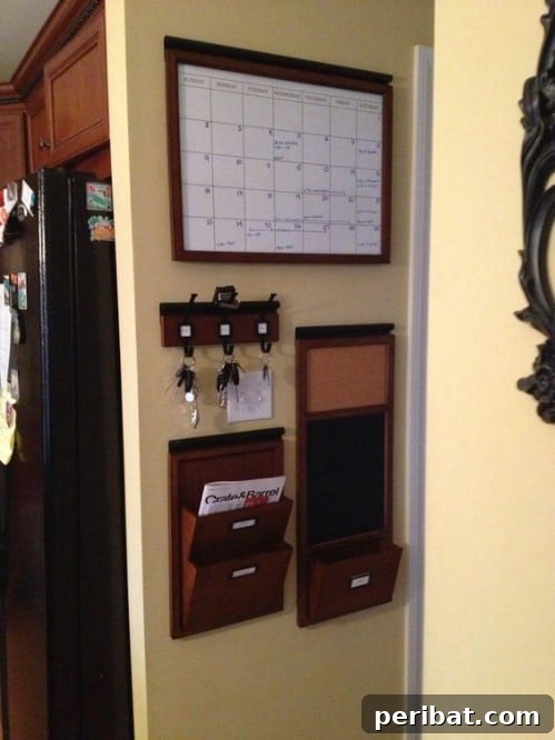 50 Brilliant Home Control Hubs for Ultimate Organization 38 Wood makes for a classy, elegant look in a command center