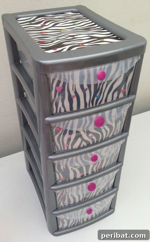 Beyond Basic Bins: Decorating Ideas to Transform Your Storage 30 This stylish bin makeover makes great use of color and contrast.