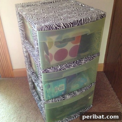 Beyond Basic Bins: Decorating Ideas to Transform Your Storage 31 Decorate the framework for a set of plastic bin drawers, rather than the bins.