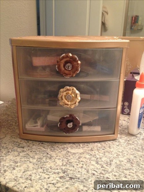 Beyond Basic Bins: Decorating Ideas to Transform Your Storage 39 Attach decorative embellishments onto your drawers.